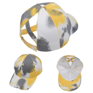 Detail view of tie-dye baseball cap with cross high ponytail hole and velcro closure