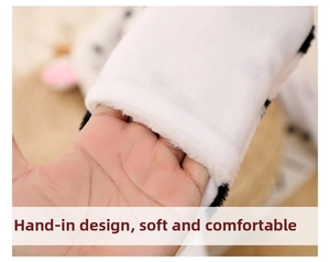 Detail showing the insert hand pocket design with soft plush material on the winter cow hat
