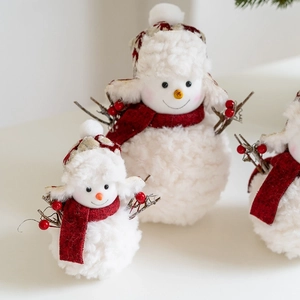 Charming plush snowman Christmas decor set with cozy red scarves and knitted hats