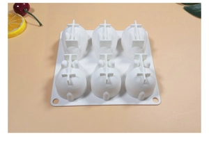 Detail view of 6-cavity white silicone mold showing flexible rabbit-shaped cavities