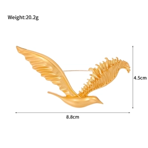 Golden eagle brooch with 8.8cm length and 20.2g weight in vintage matte metal finish
