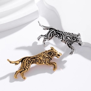 Vintage wolf head brooch pins in gold and silver finish with detailed relief patterns