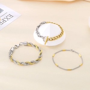 Two-tone silver and gold stainless steel bracelets with anchor chain and twisted design