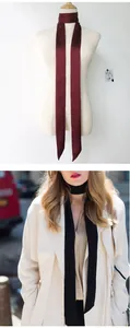 Detail showing elegant burgundy and black skinny silk scarves for neck or handbag styling
