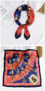 Detail of a silk-textured square scarf with classic equestrian harness and chain patterns