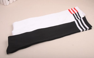 Detailed flat lay of three-stripe over-the-knee cotton sports socks in assorted colors