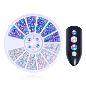 Mixed iridescent nail art pearls in a 12-slot round storage case for nail decoration