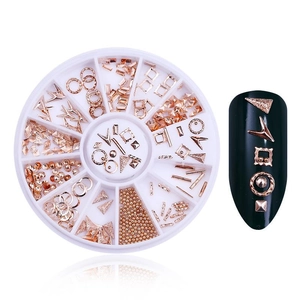 Rose gold nail art charms set featuring stars and moons in a 12-compartment wheel case