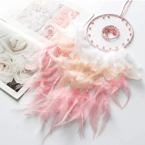 Pink tree of life dreamcatcher with natural crystals and feathers for home decoration