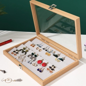Pear wood grain jewelry display tray with glass lid and soft gray velvet lining