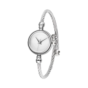 Detail of silver bangle watch featuring white dial and twisted cable band on white background
