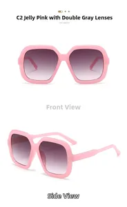 Detail of pink jelly square frame sunglasses with gradient grey lenses and metal dots