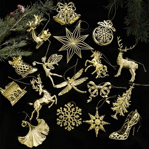 Golden Christmas tree ornaments set with reindeer and snowflakes on black background