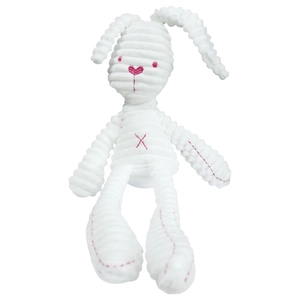 Close-up of white corduroy plush rabbit showing pink embroidered details and texture
