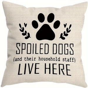 Close-up of linen pillowcase texture featuring Spoiled Dogs print and paw design