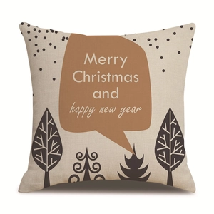 Detailed view of linen Christmas pillowcase texture with festive tree and holiday greeting
