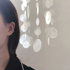 Silver bead geometric ear cuff in titanium steel worn on ear helix for a minimalist look