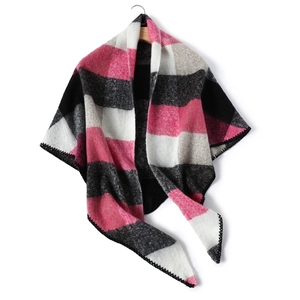 Detail of pink and grey check cashmere-like shawl featuring premium black stitched edges