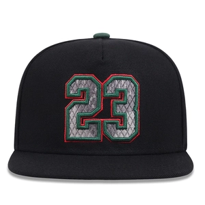 Black flat brim baseball cap featuring a premium number 23 embroidered with snakeskin texture