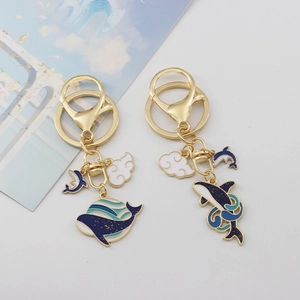 Cute golden metal whale and cloud enamel keychain pair for creative bag accessories