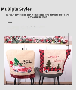 Detail of linen Christmas chair covers with festive red truck and gnome patterns
