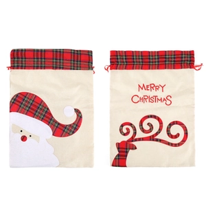 Linen Christmas gift bags with Santa and reindeer motifs featuring red drawstring closure