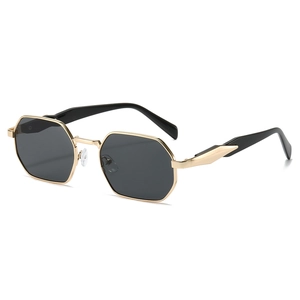 Retro polygon metal frame sunglasses with gold finish and dark lenses for men and women