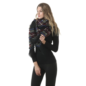 Detailed close-up of a large tartan cashmere shawl with classic colorful plaid pattern