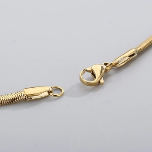 Chic golden flat snake chain necklace for women featuring a secure lobster clasp