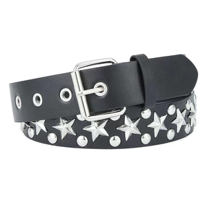 Detailed view of punk black leather belt with silver star studs and metal eyelets