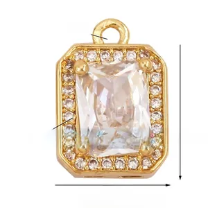 Detailed view of rectangular gold-plated pendant with dimensions and cubic zirconia inlay