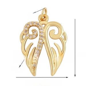 Detailed view of 19x16mm golden metal bird wing pendant with white zircon inlays