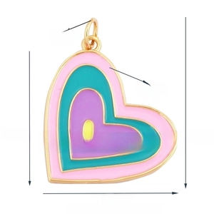 Detail of colorful multilayer enamel heart pendant with golden plating 21mm size