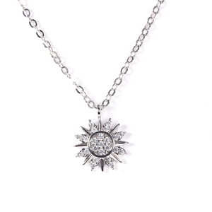 Elegant sun pendant necklace with sparkling cubic zirconia on a silver cable chain