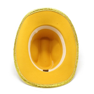 Top view of yellow felt cowboy hat featuring shimmering gold sequin trim along the edge