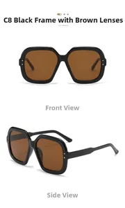 Detail view of square black frame sunglasses with tea lenses and silver rivet accents