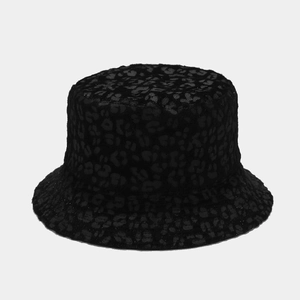 Close-up of black wool bucket hat with leopard print and minimalist dome shape