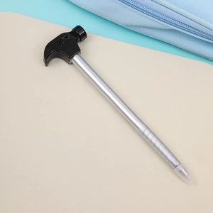 Creative hammer-shaped ballpoint pen with detailed silver body and black tool head