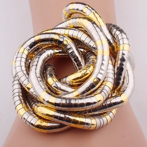 Flexible 90cm two-tone snake chain necklace in gold and silver finish on a model