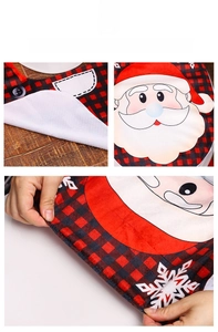 Detail of Santa Claus toilet seat cover with buffalo plaid pattern and non-slip backing