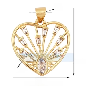 Macro detail of gold plated heart pendant featuring marquise and baguette zircon stones