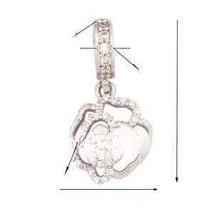 Macro shot of silver rose pendant with zircon inlay showing 23mm height dimensions