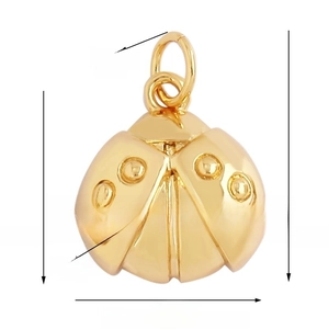 Macro view of gold ladybug pendant detailing 13mm width and 18mm height dimensions