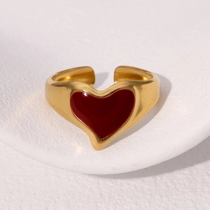 Adjustable gold plated stainless steel ring with a vintage red heart enamel center