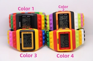 Detail view of multi-color LED building block digital watches in various color combinations