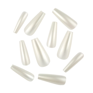 Macro detail of ten pearlescent white long coffin-shaped press-on nail pieces