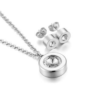 Polished stainless steel jewelry set with round clear crystals on necklace and earrings