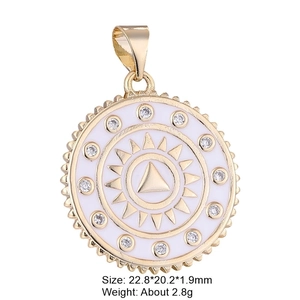 Detail of gold sun tarot pendant with white enamel, cubic zirconia, and dimensions