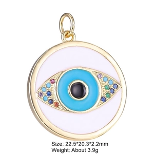 Detailed view of evil eye pendant with blue enamel and colorful rhinestones