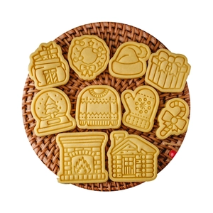 10-piece Christmas cookie cutter set with gingerbread man and holiday designs on tray
